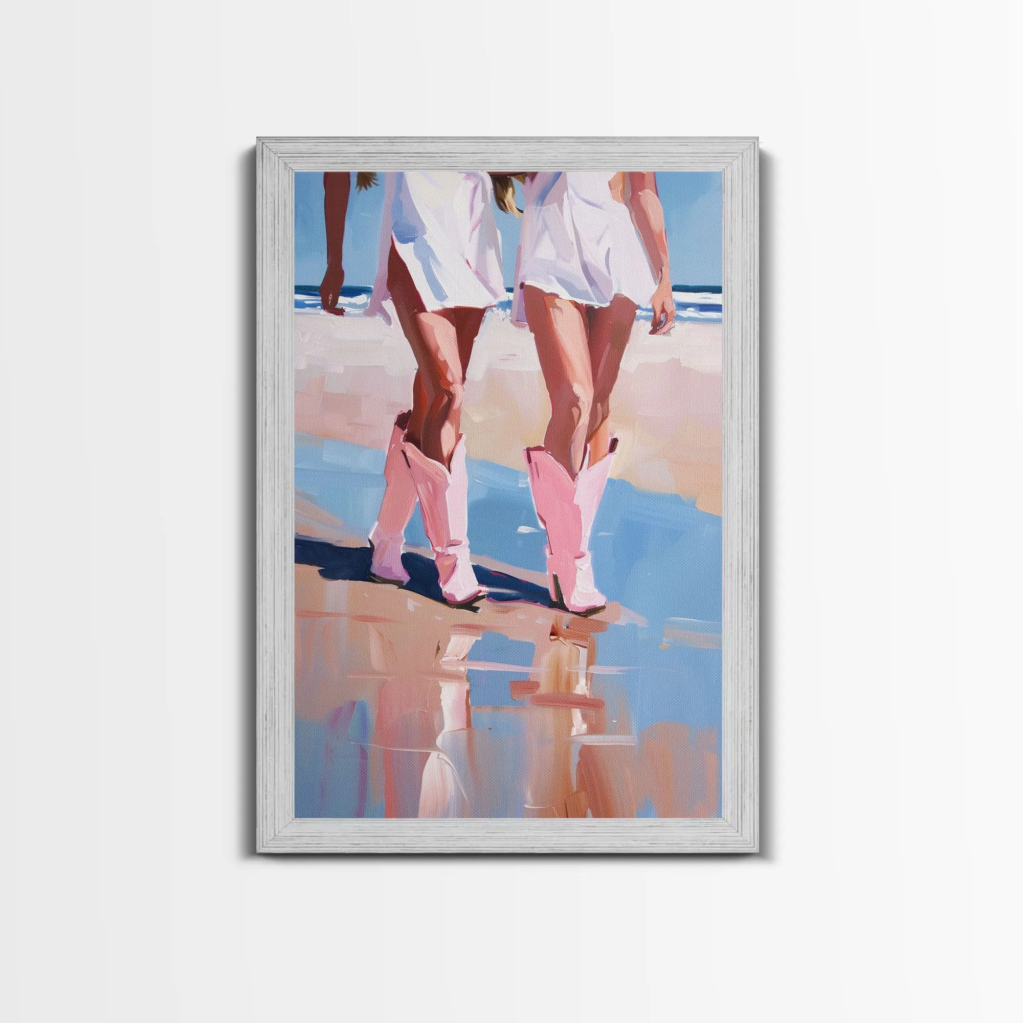 Cowgirls walking on the beach wearing pink cowboy boots, artistic reflection Framed Canvas Print - beach fashion, summer decor, vibrant art